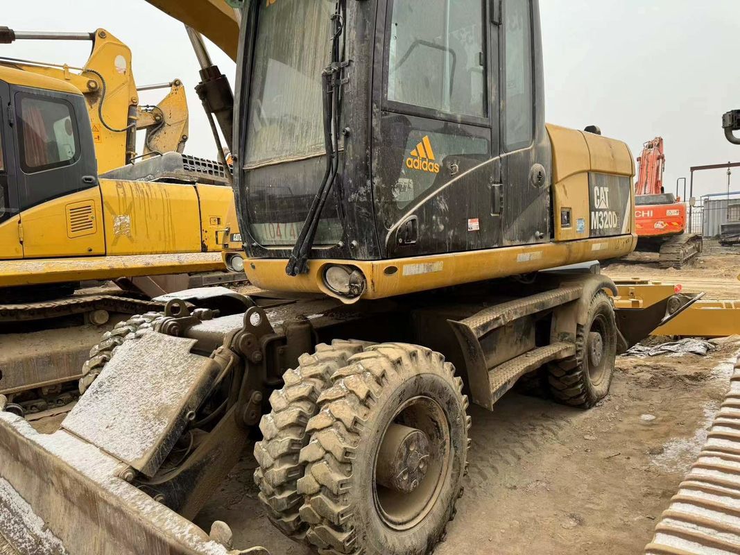 90% Caterpillar M317D2 고품질과 최고의 성능을 가진 사용 된 바퀴 발굴기 판매