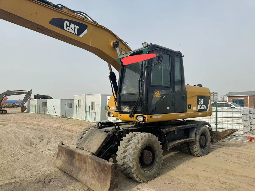 90% Caterpillar M317D2 고품질과 최고의 성능을 가진 사용 된 바퀴 발굴기 판매