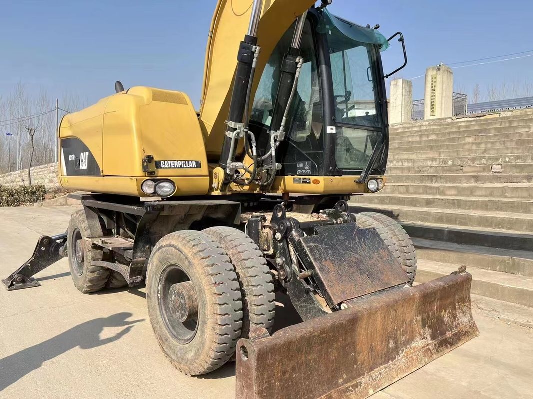 90% Caterpillar M317D2 고품질과 최고의 성능을 가진 사용 된 바퀴 발굴기 판매